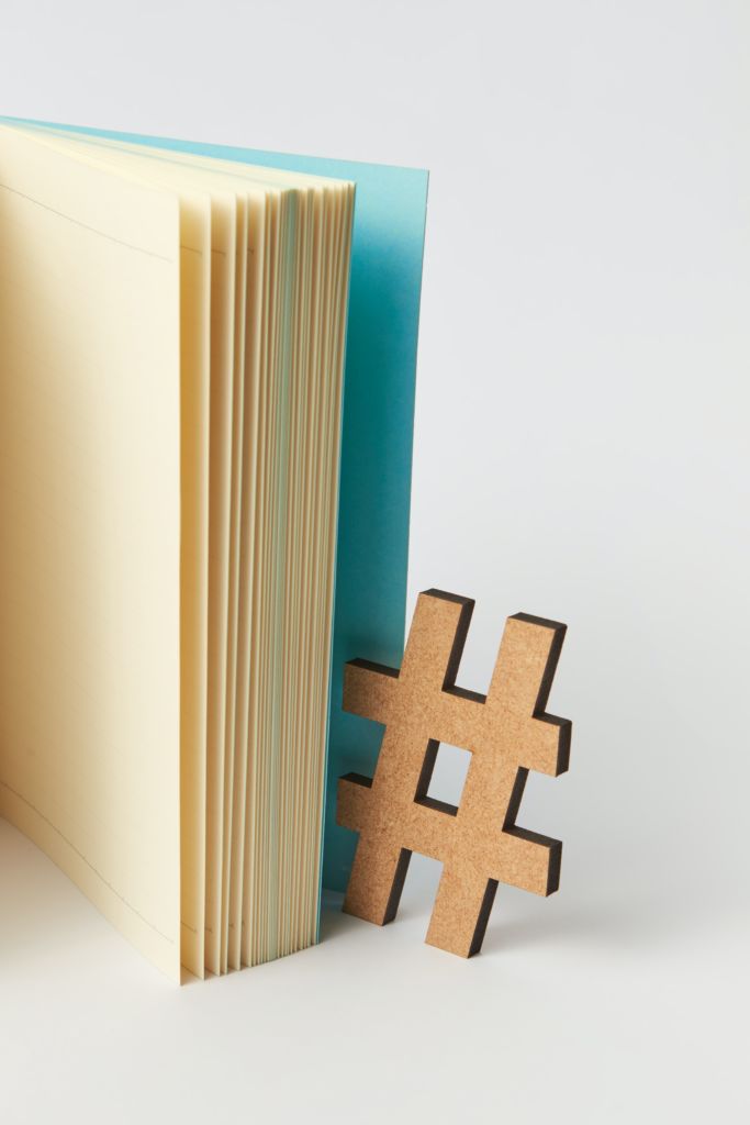 Image of hashtag sticking out of book