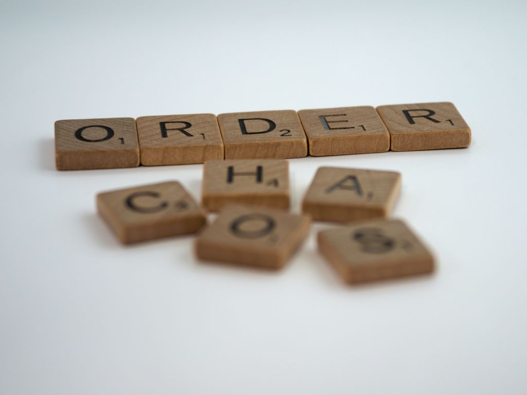 Scrabble tiles read "order" and "chaos." To create order for your marketing strategy, try a digital marketing inventory to measure marketing effectiveness.